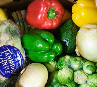 A box full of fresh keto approved produce is ready for pickup or delivery from Martinous Produce Company.