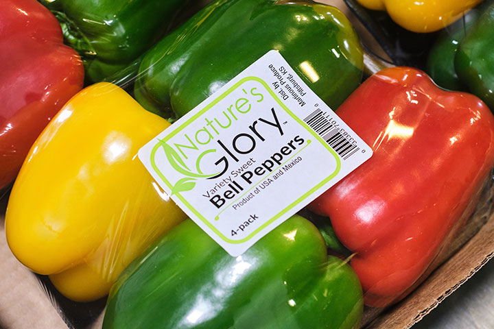 Red, green, and yellow bell peppers are repackaged as Nature's Glory for grocery and foodservice operators in Oklahoma, Missouri, Kansas, and Arkansas.